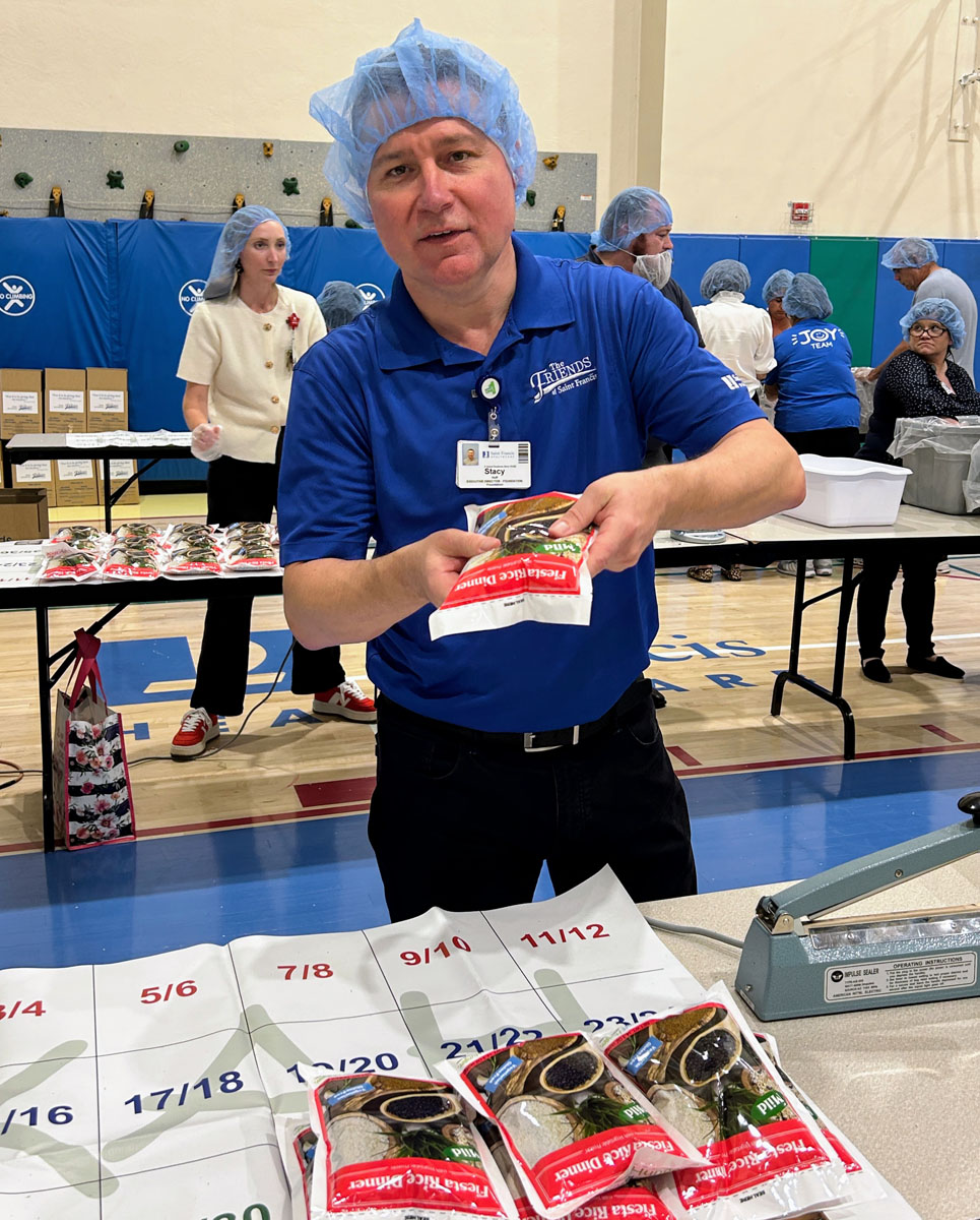 A scene from the Foundation's Saint Francis 150th Anniversary Food Packing Event