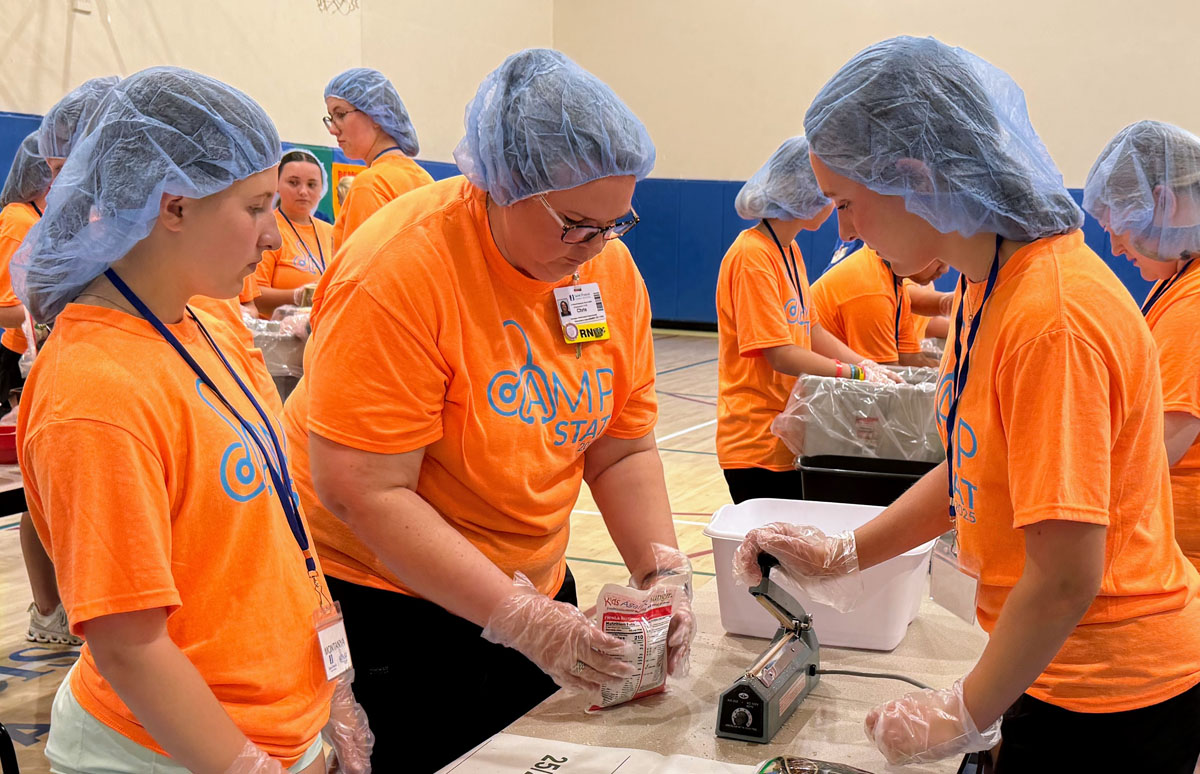 A scene from the Foundation's Saint Francis 150th Anniversary Food Packing Event