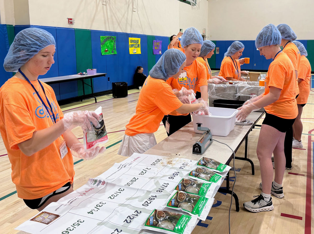 A scene from the Foundation's Saint Francis 150th Anniversary Food Packing Event
