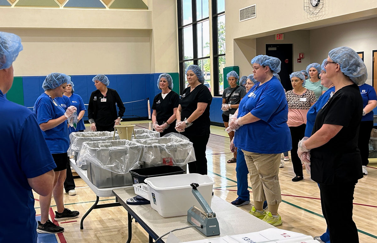 A scene from the Foundation's Saint Francis 150th Anniversary Food Packing Event