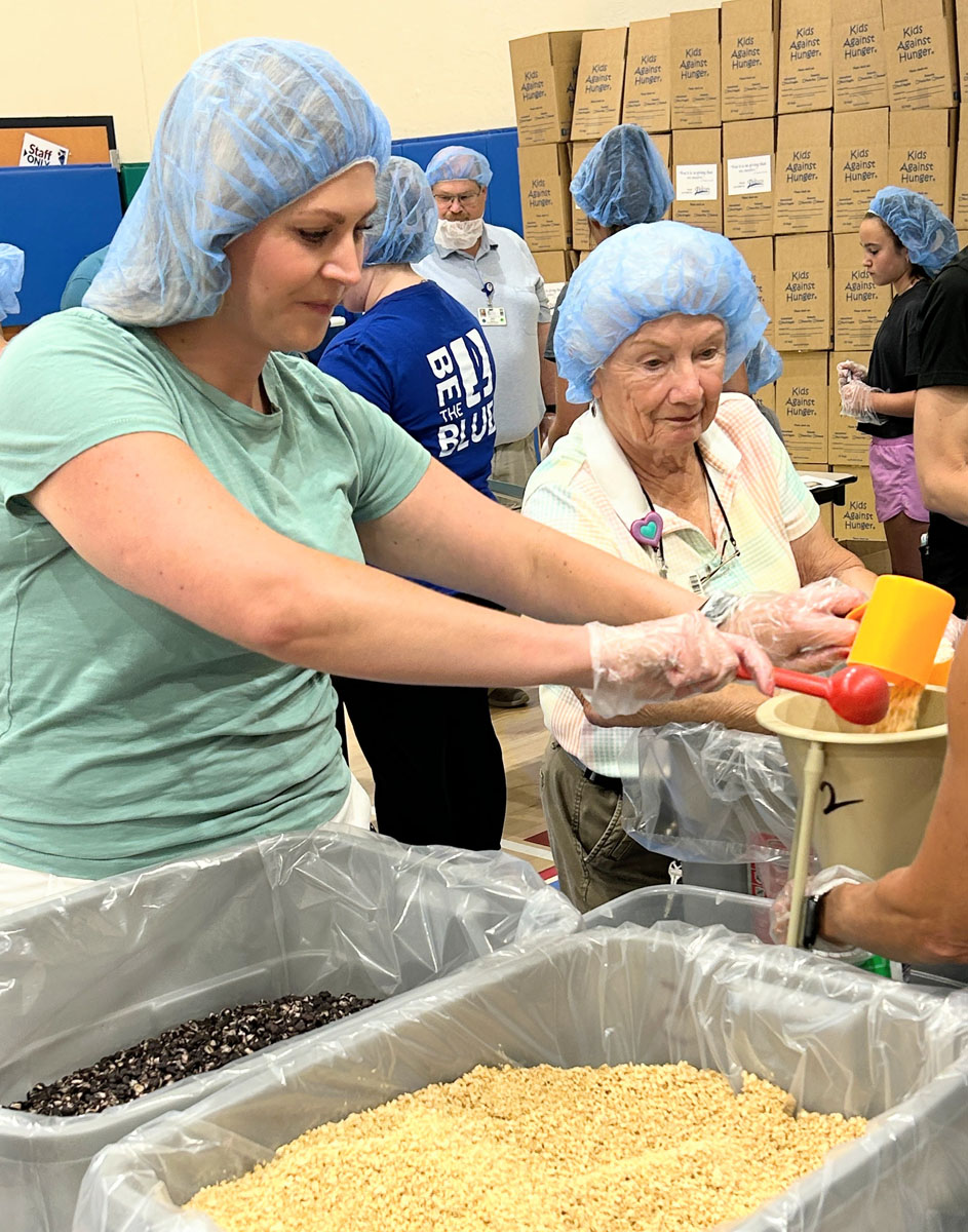A scene from the Foundation's Saint Francis 150th Anniversary Food Packing Event
