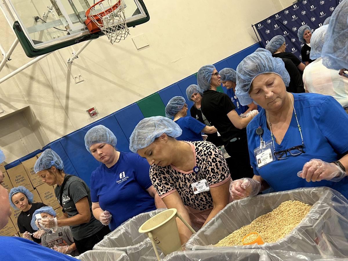 A scene from the Foundation's Saint Francis 150th Anniversary Food Packing Event