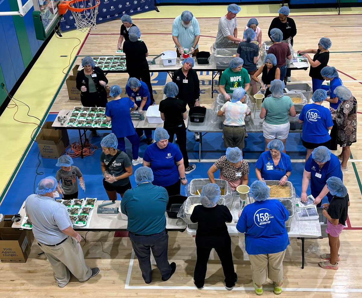 A scene from the Foundation's Saint Francis 150th Anniversary Food Packing Event