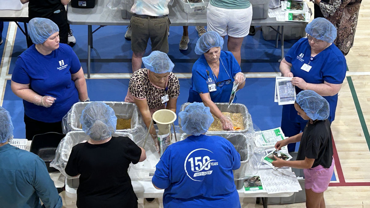 A scene from the Foundation's Saint Francis 150th Anniversary Food Packing Event