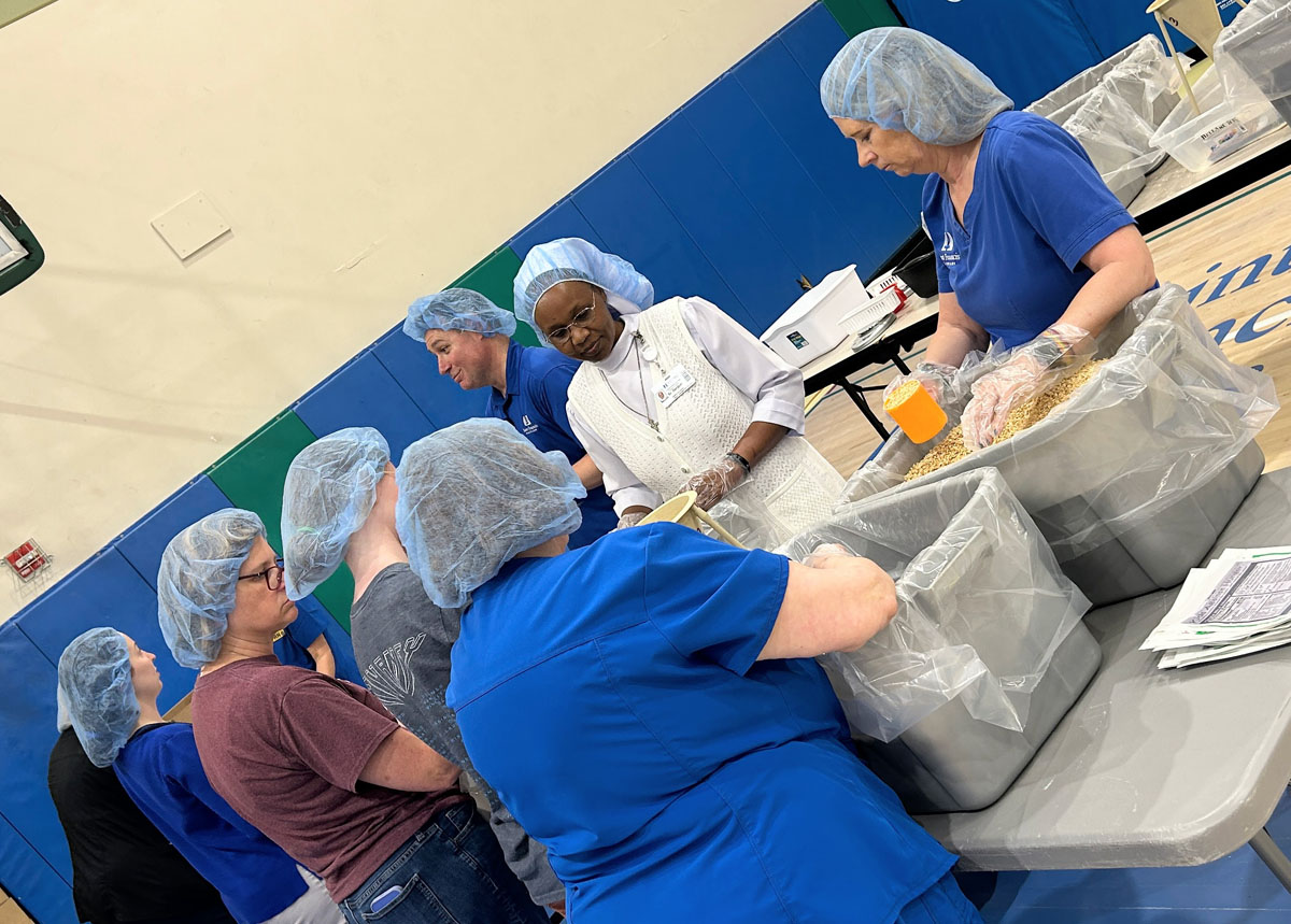A scene from the Foundation's Saint Francis 150th Anniversary Food Packing Event