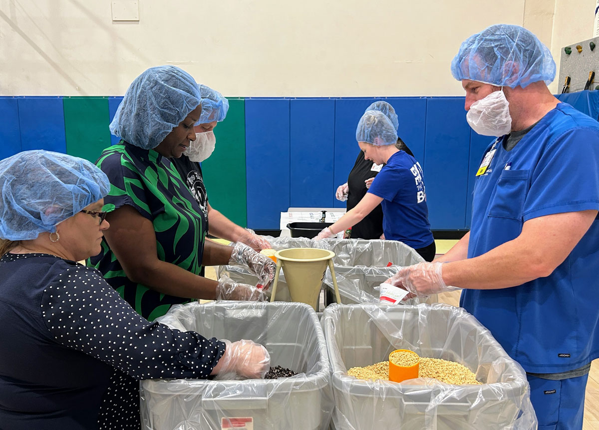 A scene from the Foundation's Saint Francis 150th Anniversary Food Packing Event