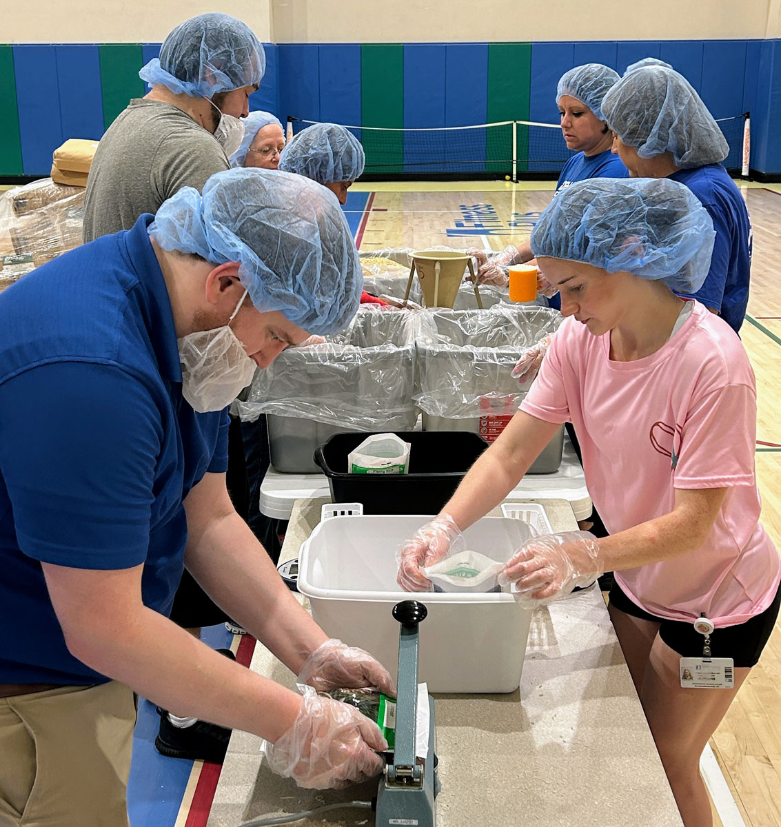 A scene from the Foundation's Saint Francis 150th Anniversary Food Packing Event