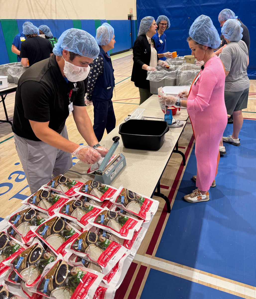 A scene from the Foundation's Saint Francis 150th Anniversary Food Packing Event