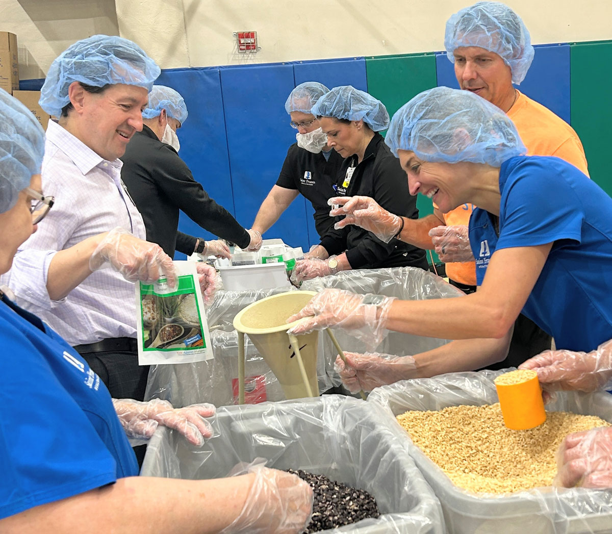 A scene from the Foundation's Saint Francis 150th Anniversary Food Packing Event