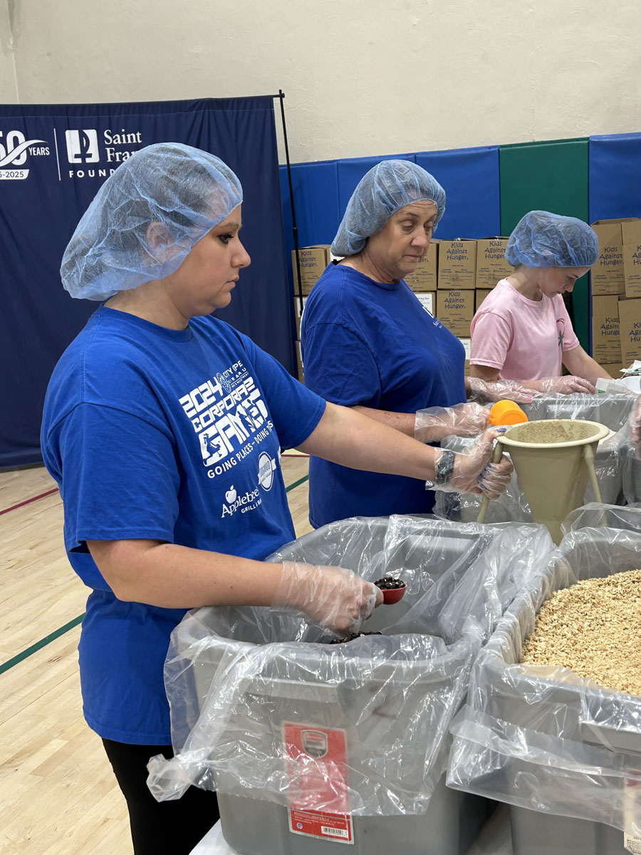 A scene from the Foundation's Saint Francis 150th Anniversary Food Packing Event