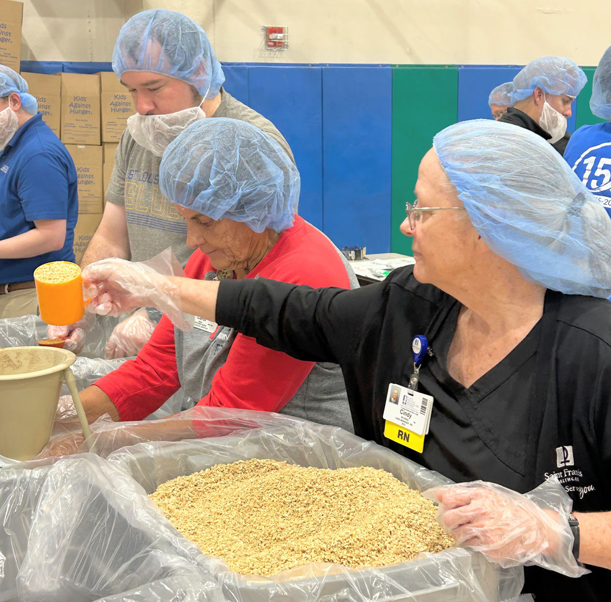 A scene from the Foundation's Saint Francis 150th Anniversary Food Packing Event