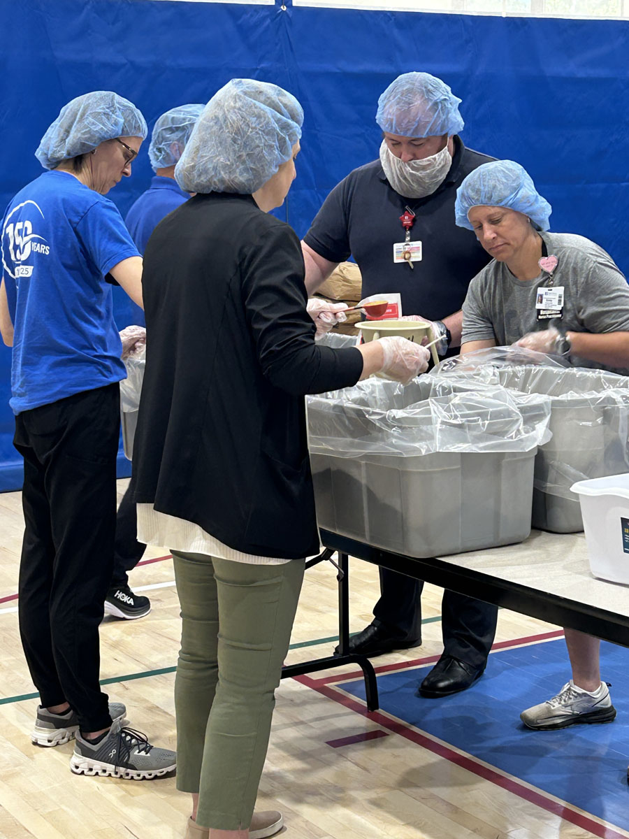 A scene from the Foundation's Saint Francis 150th Anniversary Food Packing Event