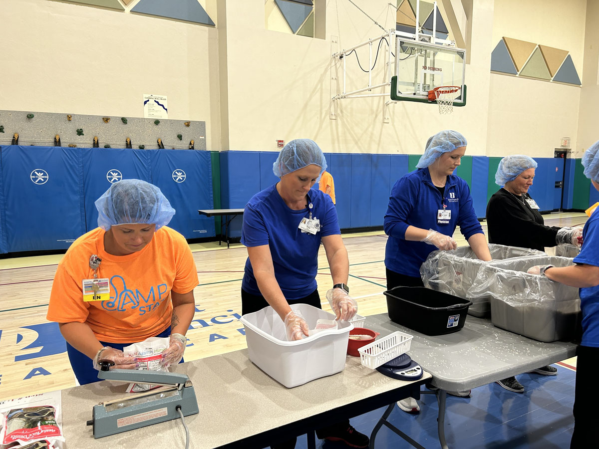 A scene from the Foundation's Saint Francis 150th Anniversary Food Packing Event