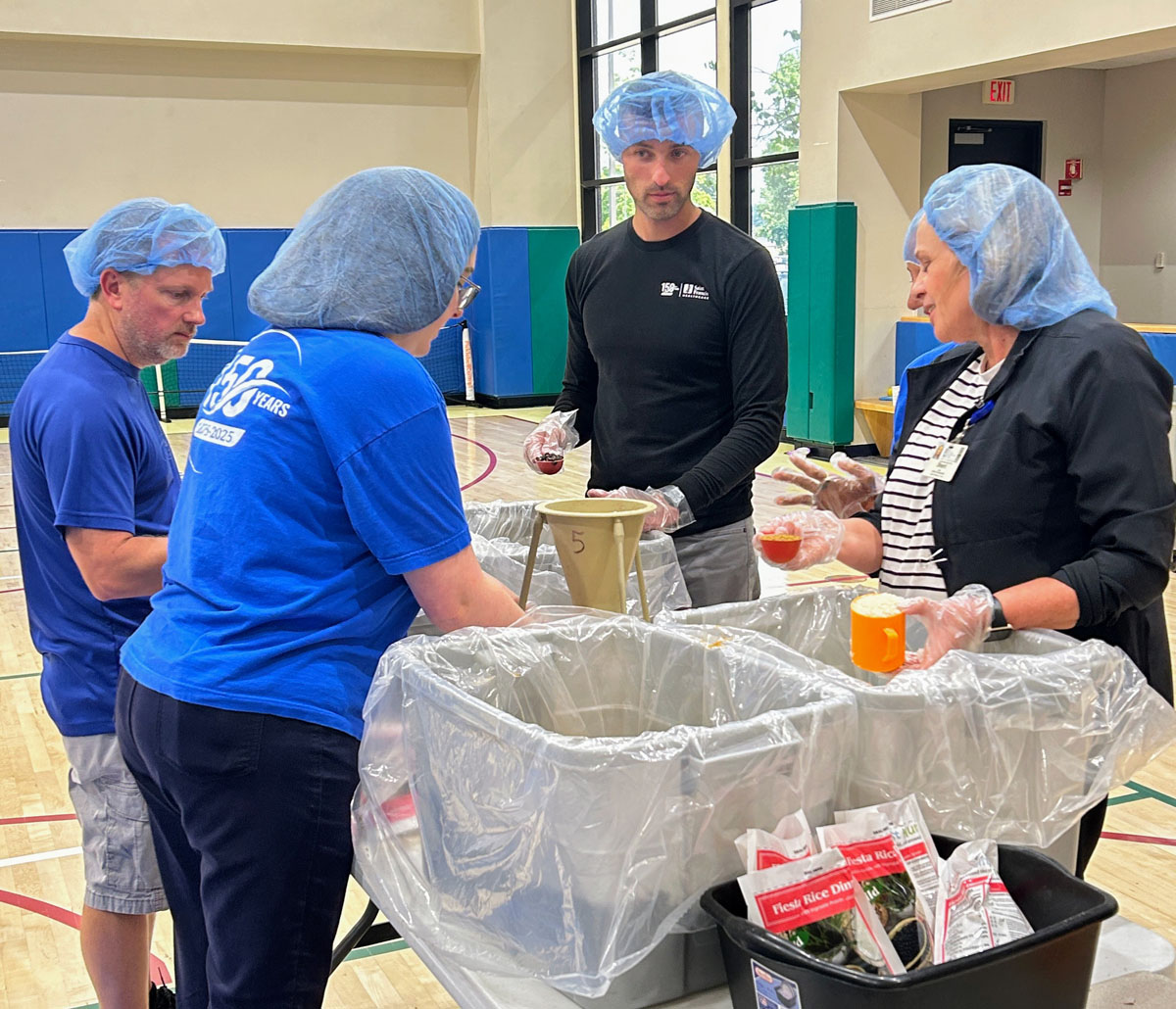 A scene from the Foundation's Saint Francis 150th Anniversary Food Packing Event