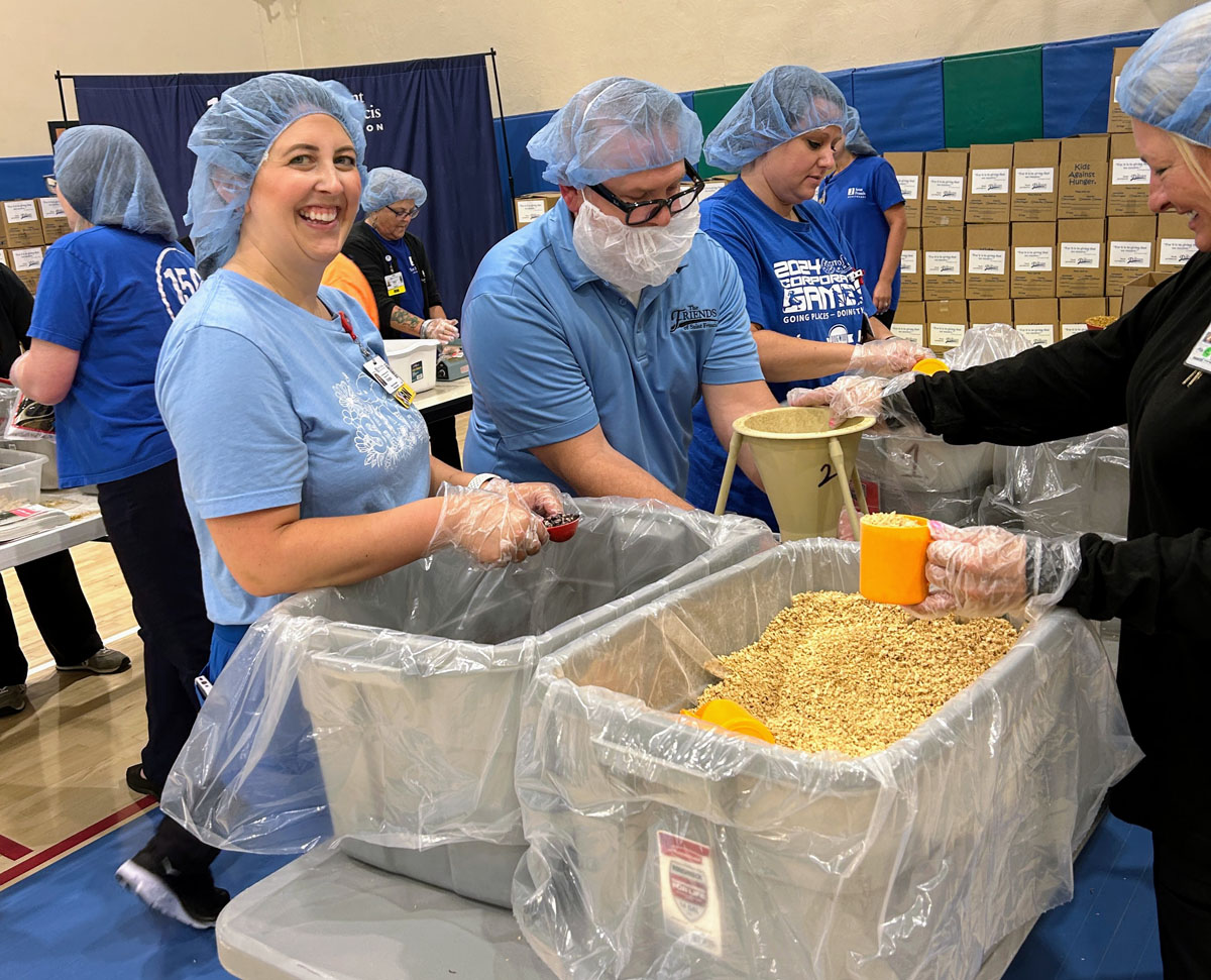 A scene from the Foundation's Saint Francis 150th Anniversary Food Packing Event