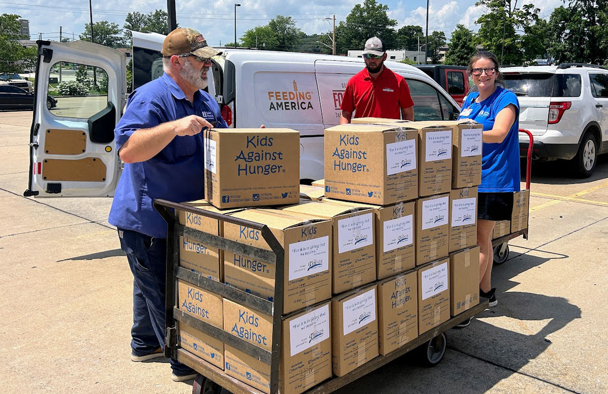 A scene from the Foundation's Saint Francis 150th Anniversary Food Packing Event