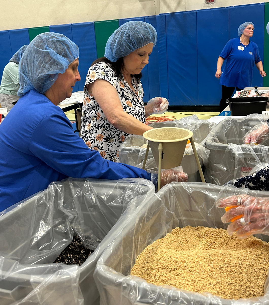 A scene from the Foundation's Saint Francis 150th Anniversary Food Packing Event