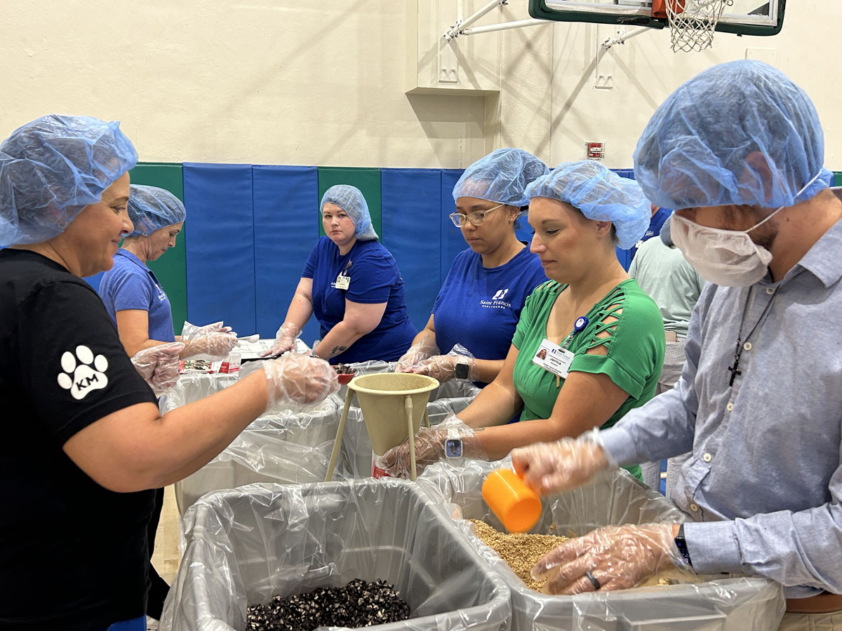 A scene from the Foundation's Saint Francis 150th Anniversary Food Packing Event