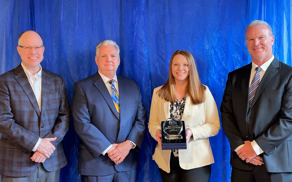 Saint Francis President and CEO Justin Davison; John Denkler, First State Bancshares Chief Executive Officer and Co Vice Chairman; Shelby Hacker, First State Community Bank Community Bank Manager; and Marvin Adams, First State Community Bank President